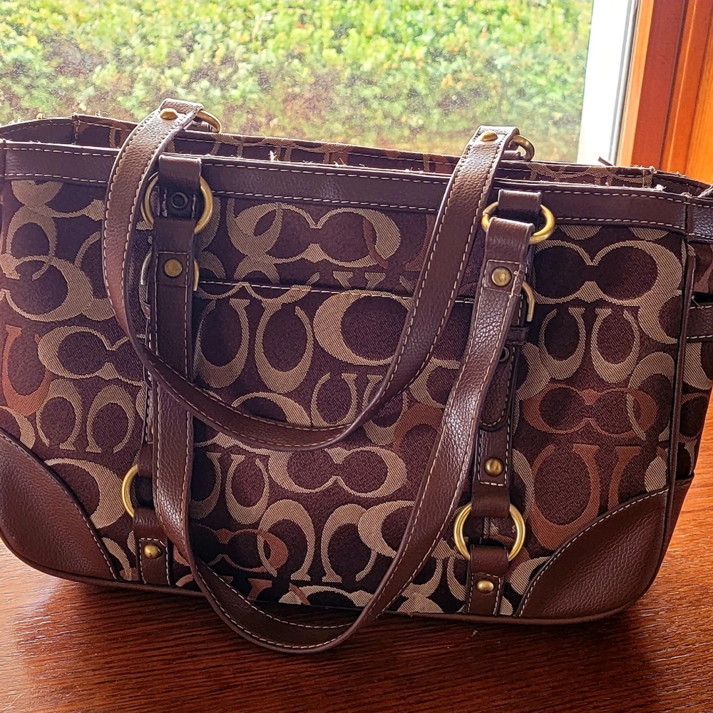 Brown Coach signature canvas hand bag